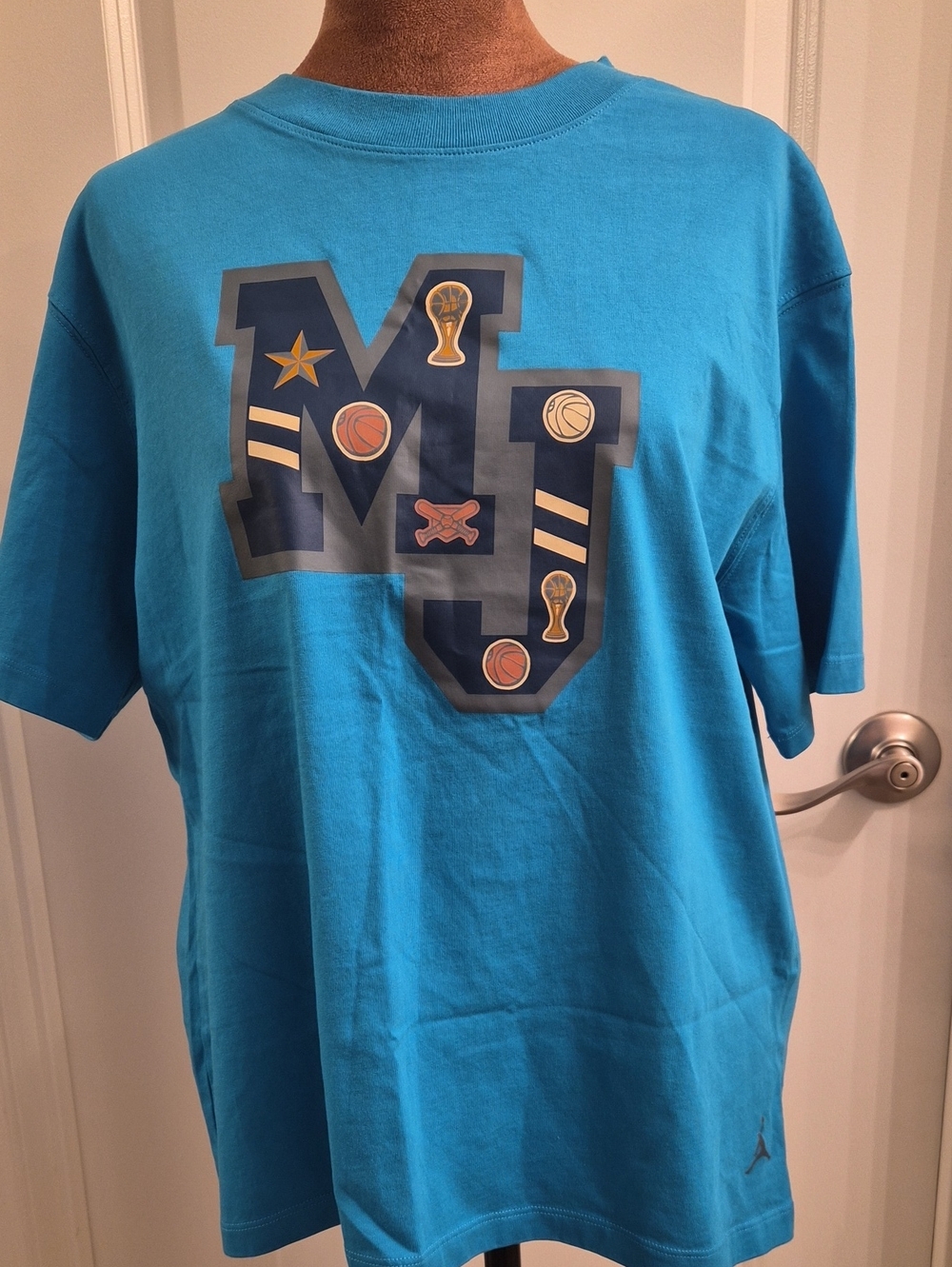 Jordan Bright Turquoise Graphic Short Sleeve Tee.Size S.m